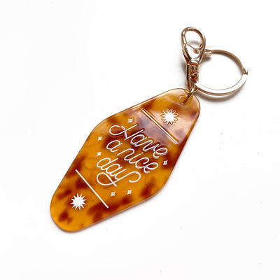 Leo Horoscope Motel Keychain